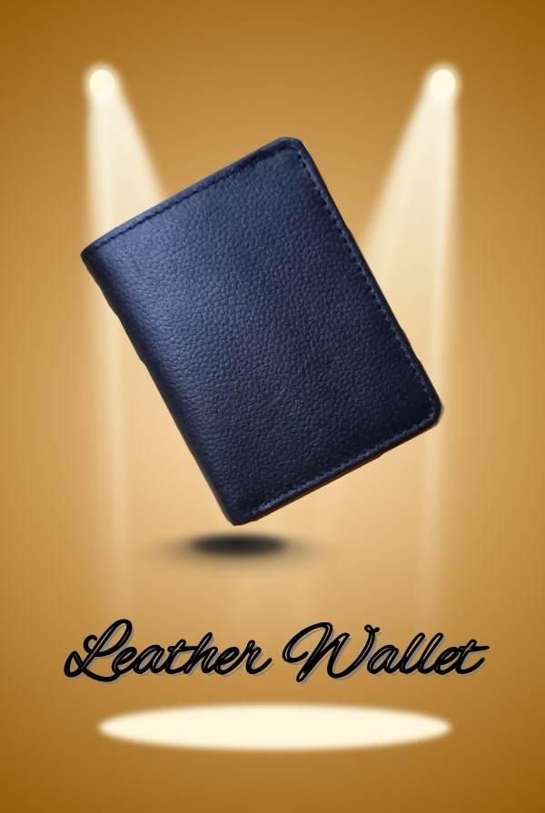 Premium black leather wallet displayed under dual golden spotlights on a soft brown background, emphasizing texture and craftsmanship.